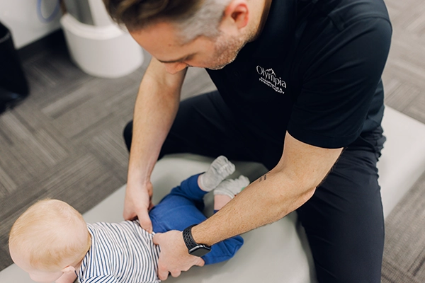 Chiropractor Bartlett IL Frank Ambrosio Office Tour Adjusting Baby Chiropractor Bartlett IL Frank Ambrosio Office Tour Adjusting Baby
